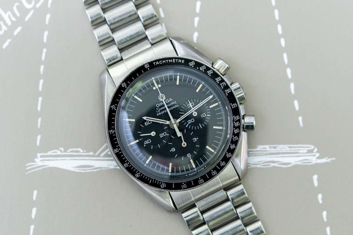 Omega sale speedmaster glass